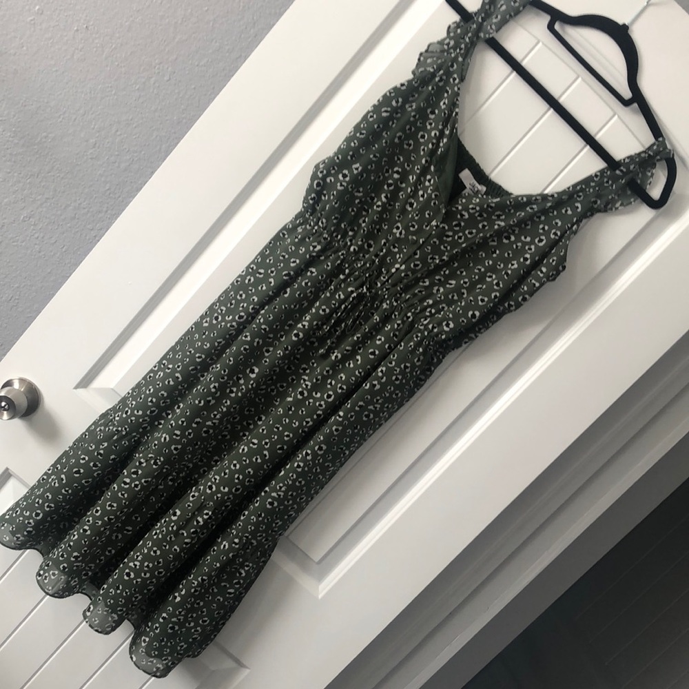 Green dress with black and white dots
